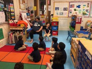 parent and child reading to class
