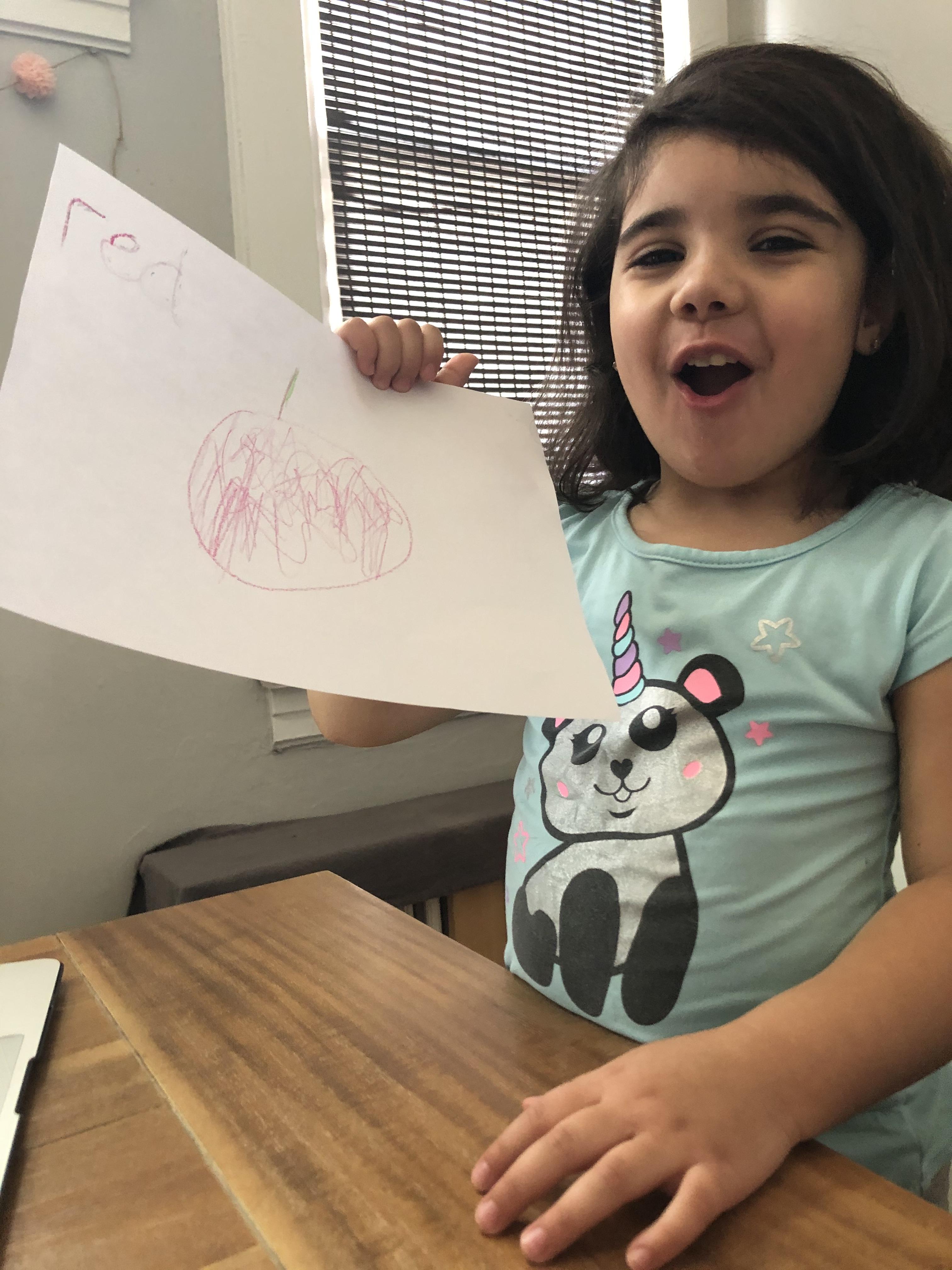 little girl who drew a red apple