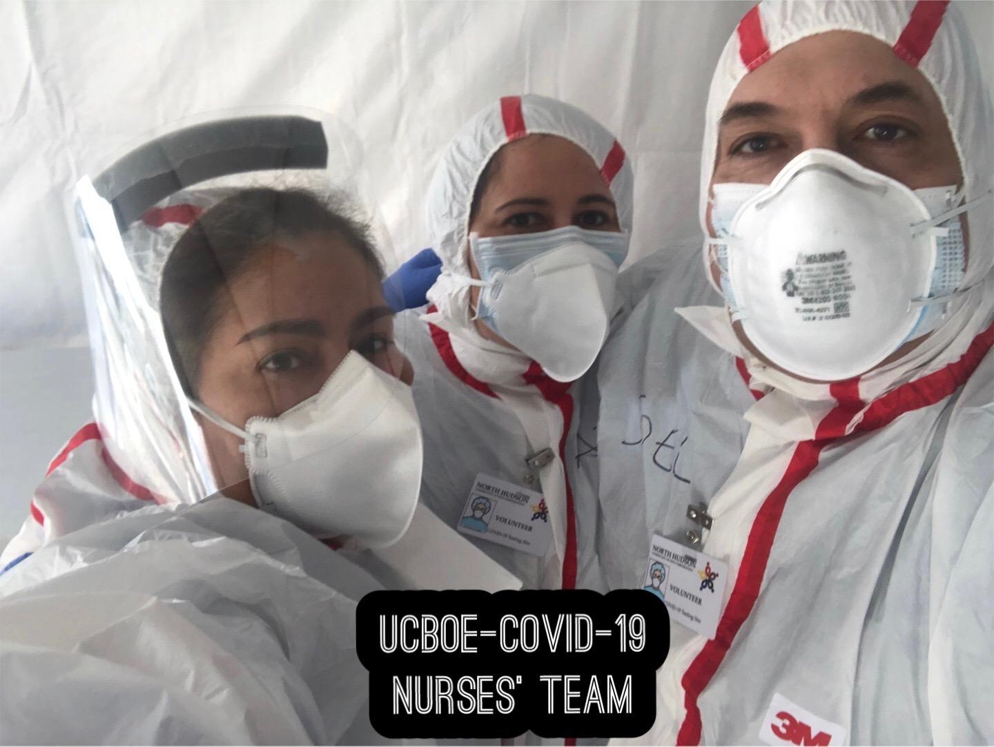3 UC nurses in hazmat suits