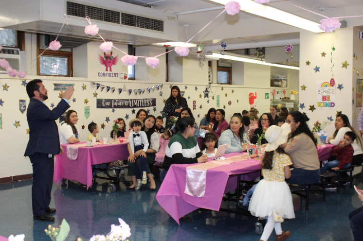 Enjoying the Mother's Day Tea Party at the Jefferson School