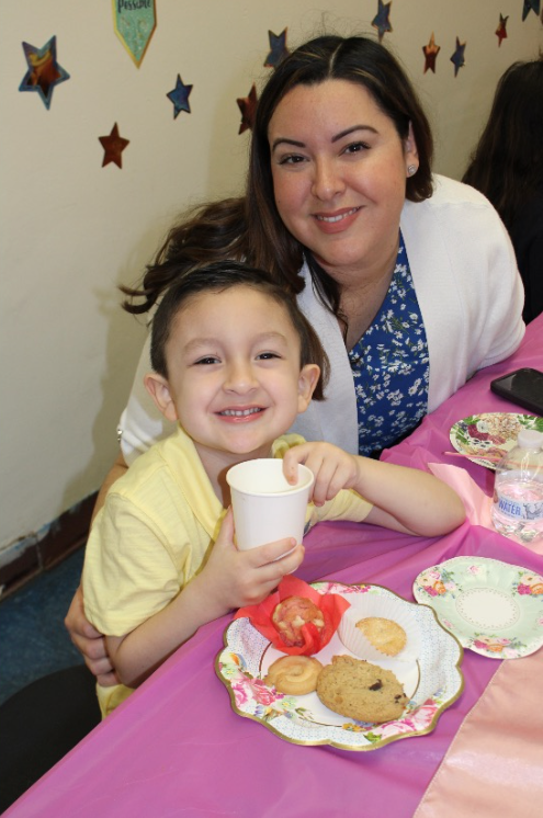 Enjoying the Mother's Day Tea Party at the Jefferson School